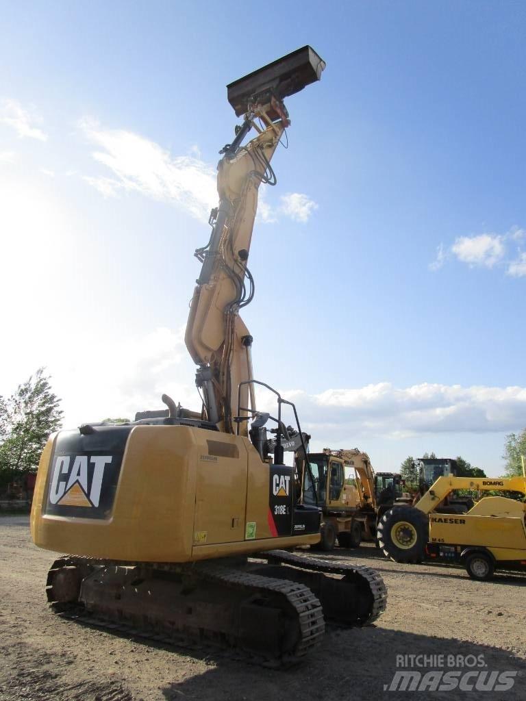 CAT 318 E L Гусеничные экскаваторы