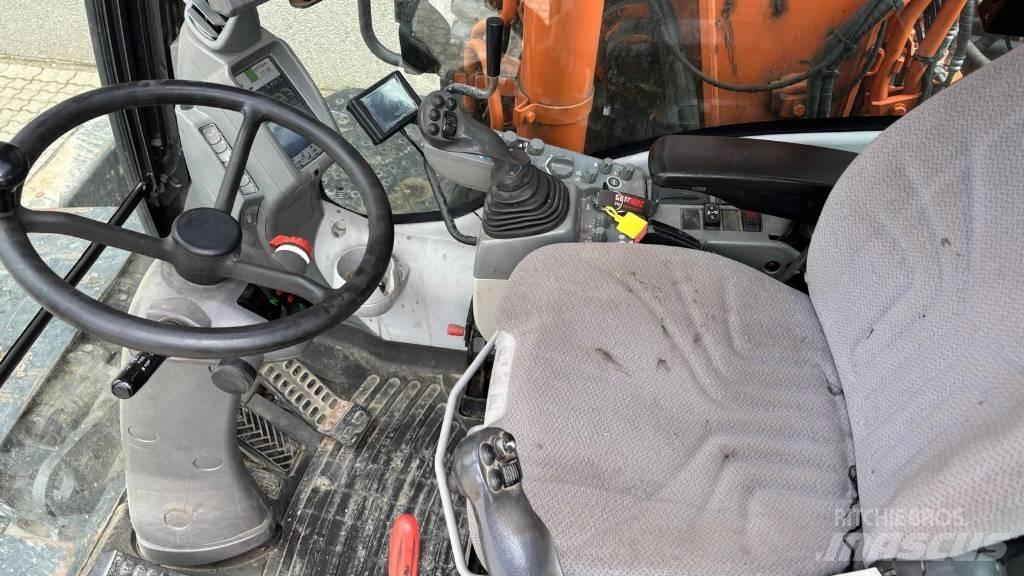 Hitachi ZX 140 W-5 Колёсные экскаваторы