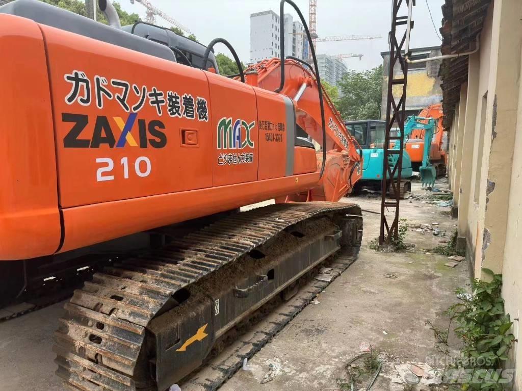Hitachi ZX 210 Гусеничные экскаваторы