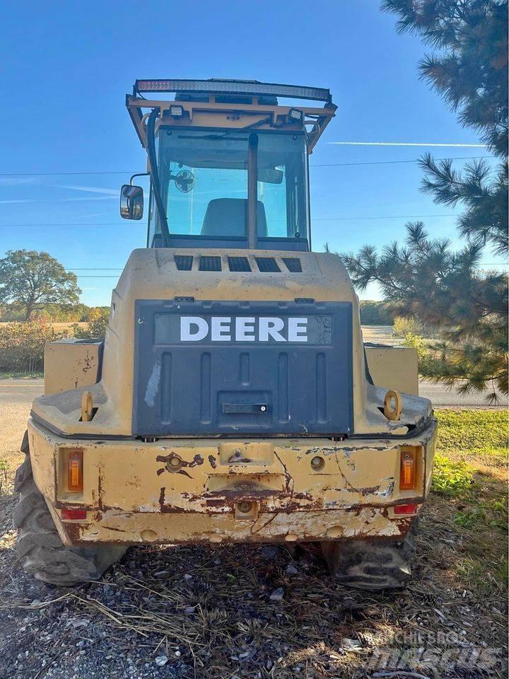 John Deere 324H Фронтальные погрузчики