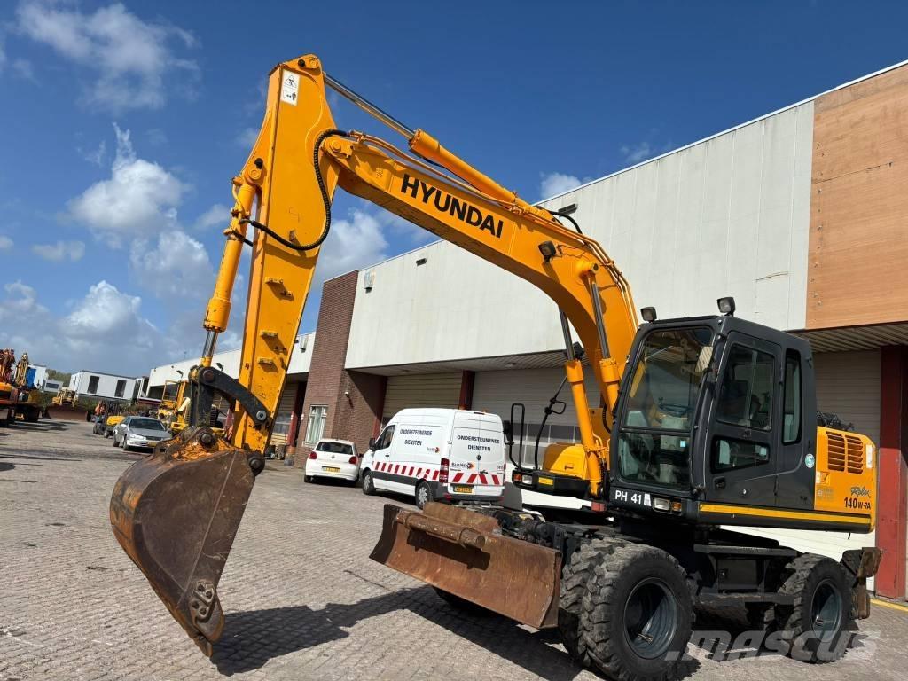 Hyundai 140W-7A Колёсные экскаваторы