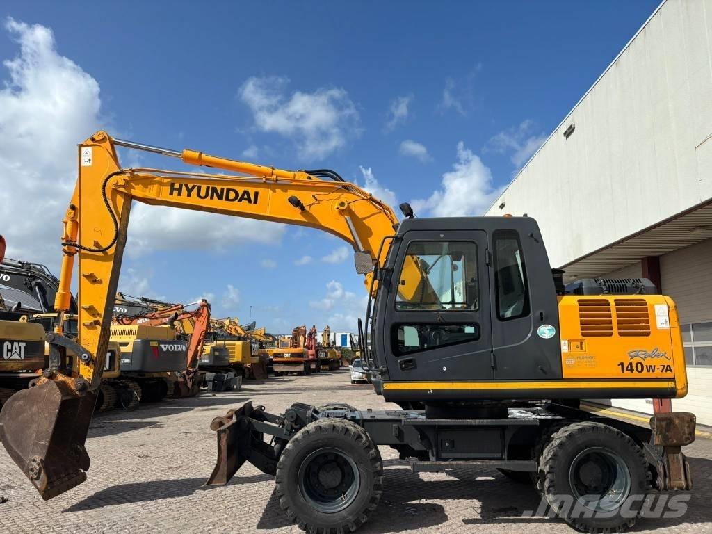 Hyundai 140W-7A Колёсные экскаваторы