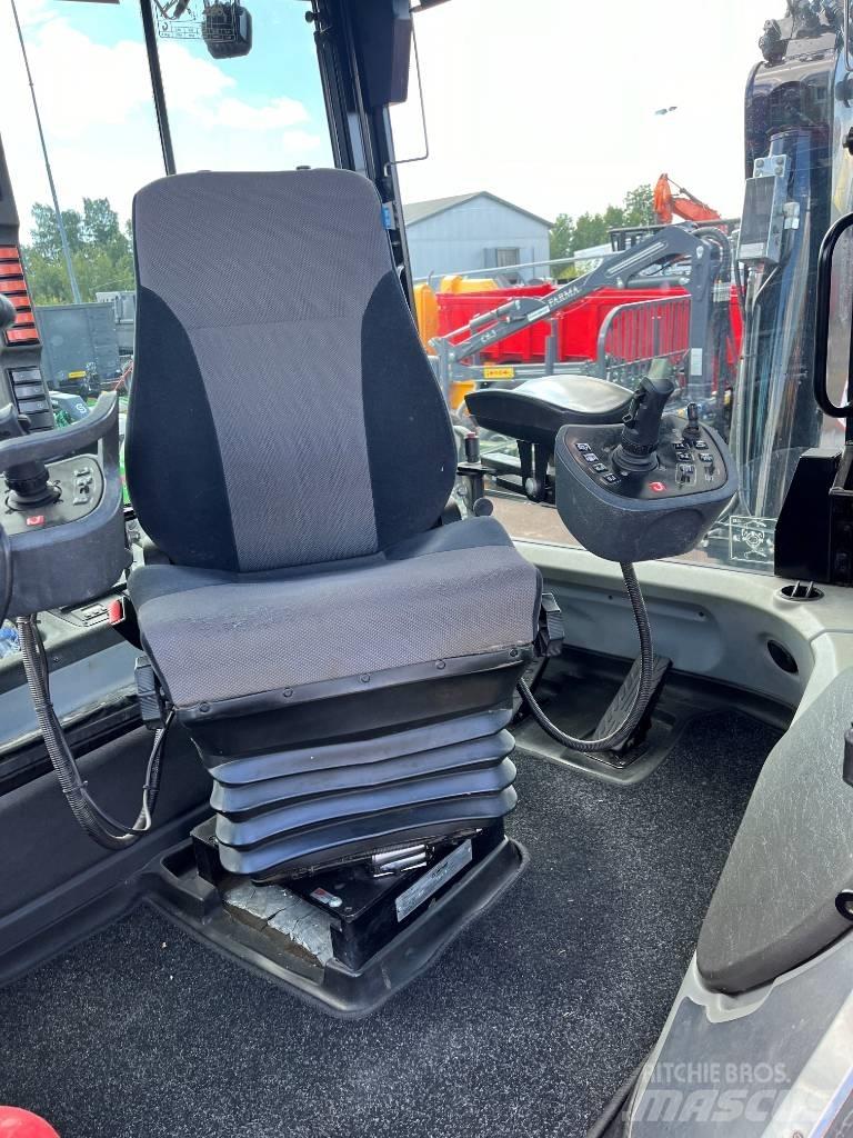 Huddig 1260C City Экскаваторы-погрузчики