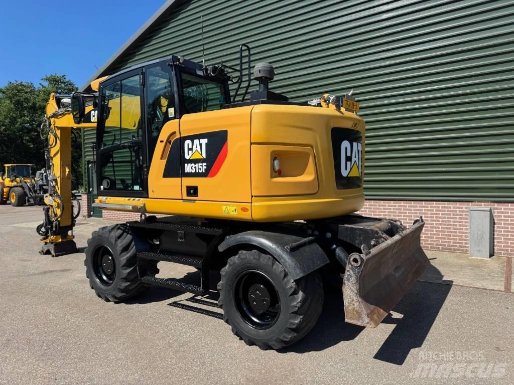 CAT M 315 F Колёсные экскаваторы