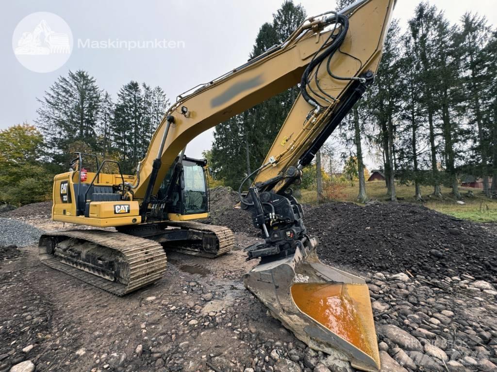 CAT 323 Гусеничные экскаваторы