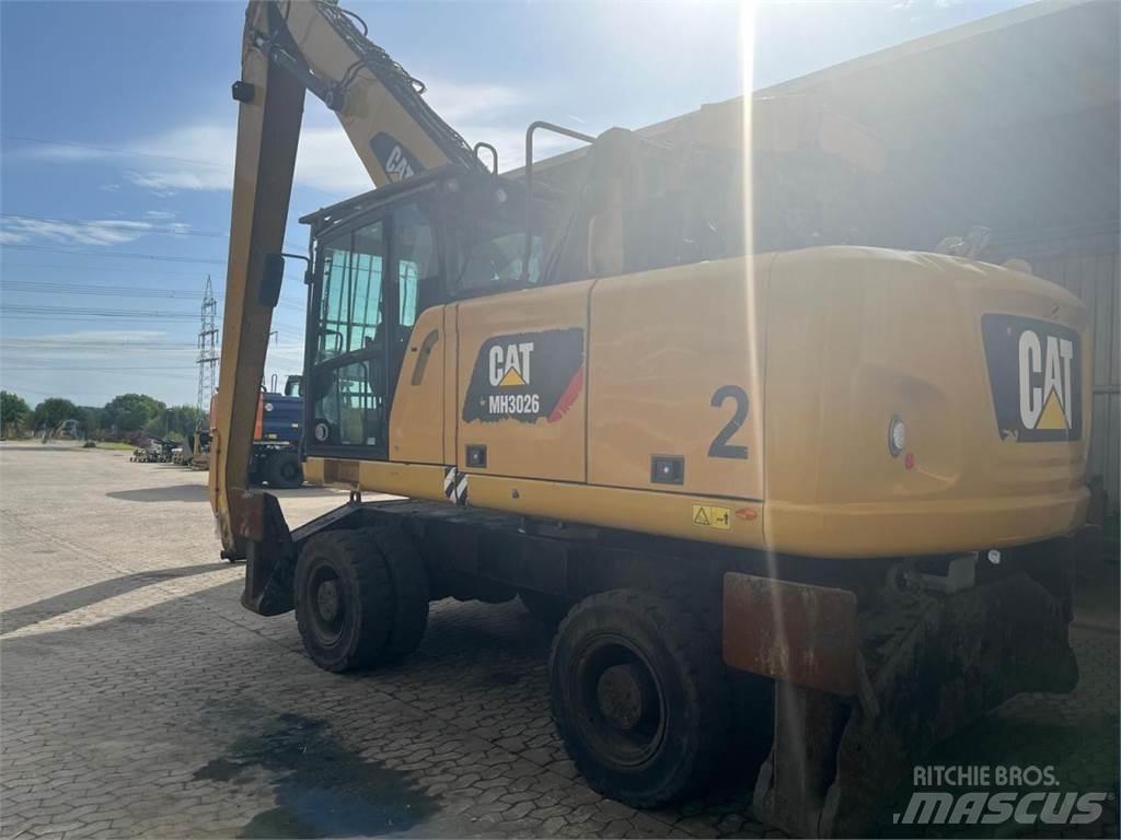 CAT MH3026 Колёсные экскаваторы
