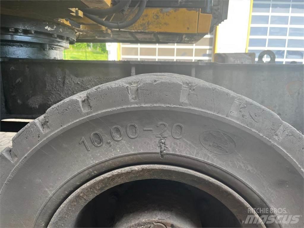 CAT MH3026 Колёсные экскаваторы