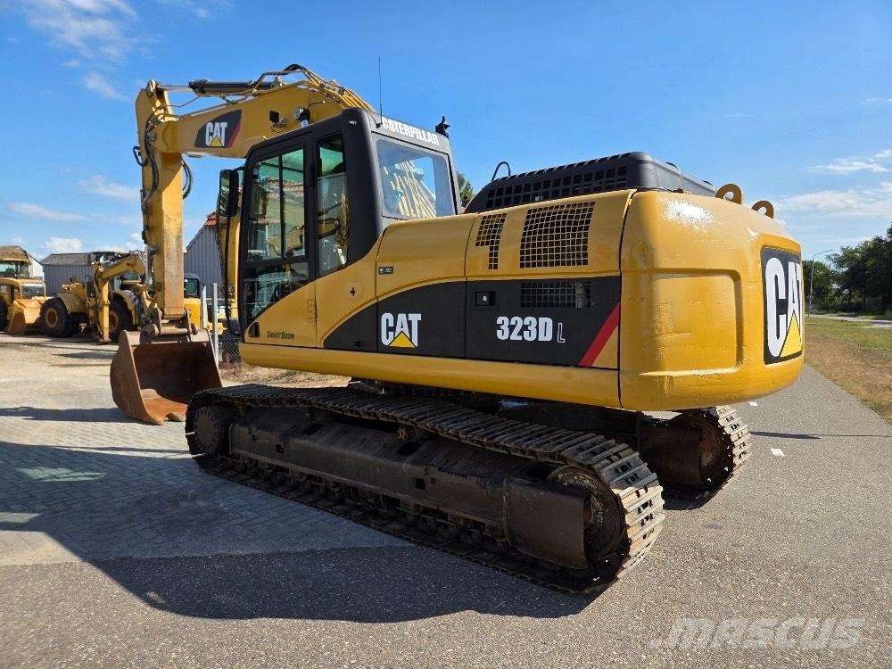 CAT 323DL Гусеничные экскаваторы