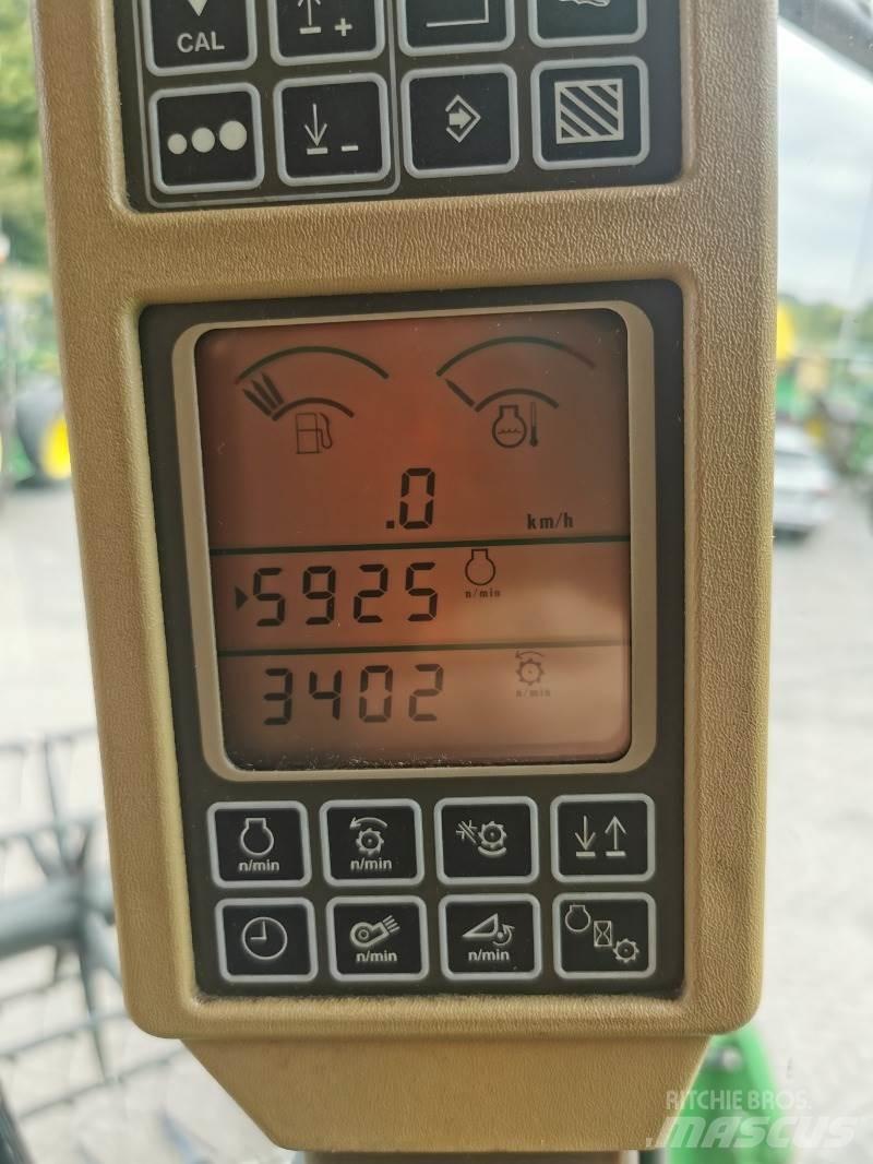 John Deere T560 Зерноуборочные комбайны