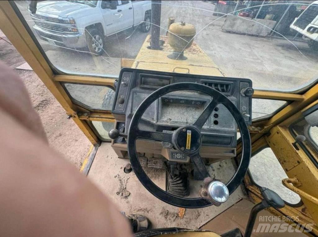 CAT 416 Экскаваторы-погрузчики