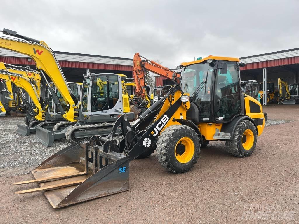 JCB 406 - Uthyres Фронтальные погрузчики