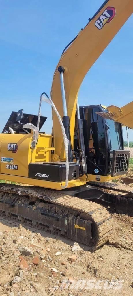 CAT 313 Малые экскаваторы 7т-12т