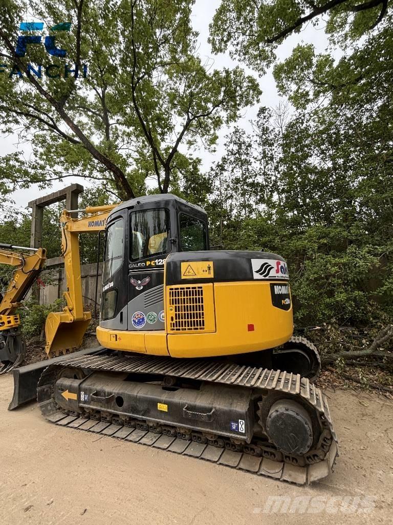 Komatsu PC128US Гусеничные экскаваторы