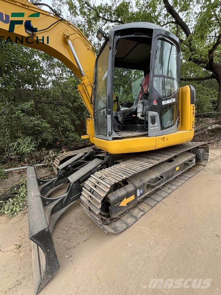 Komatsu PC128US Гусеничные экскаваторы