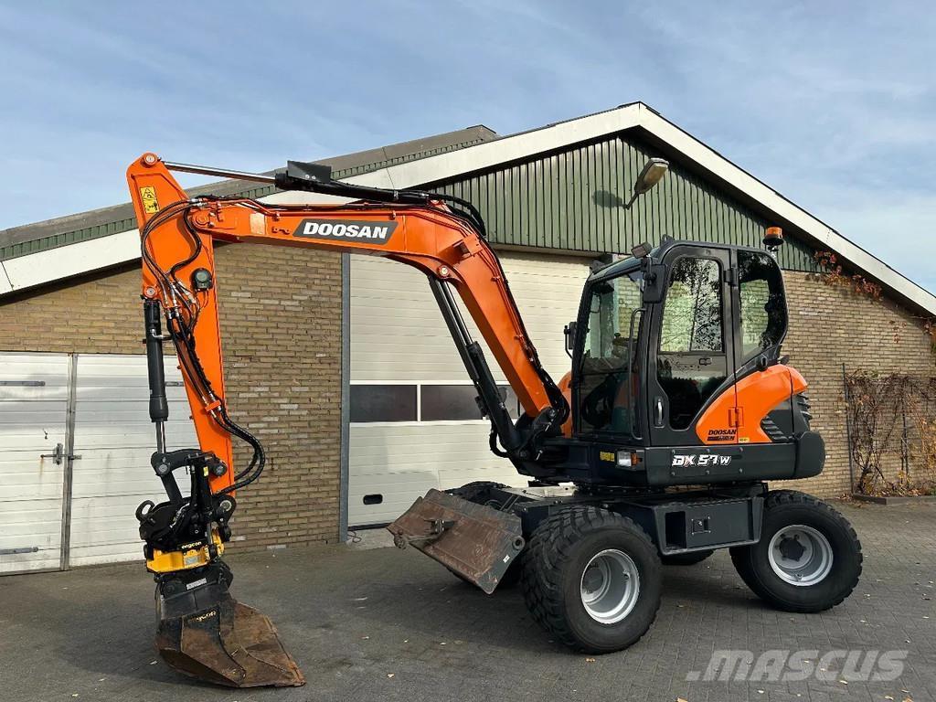 Doosan DX57W-7 Колёсные экскаваторы