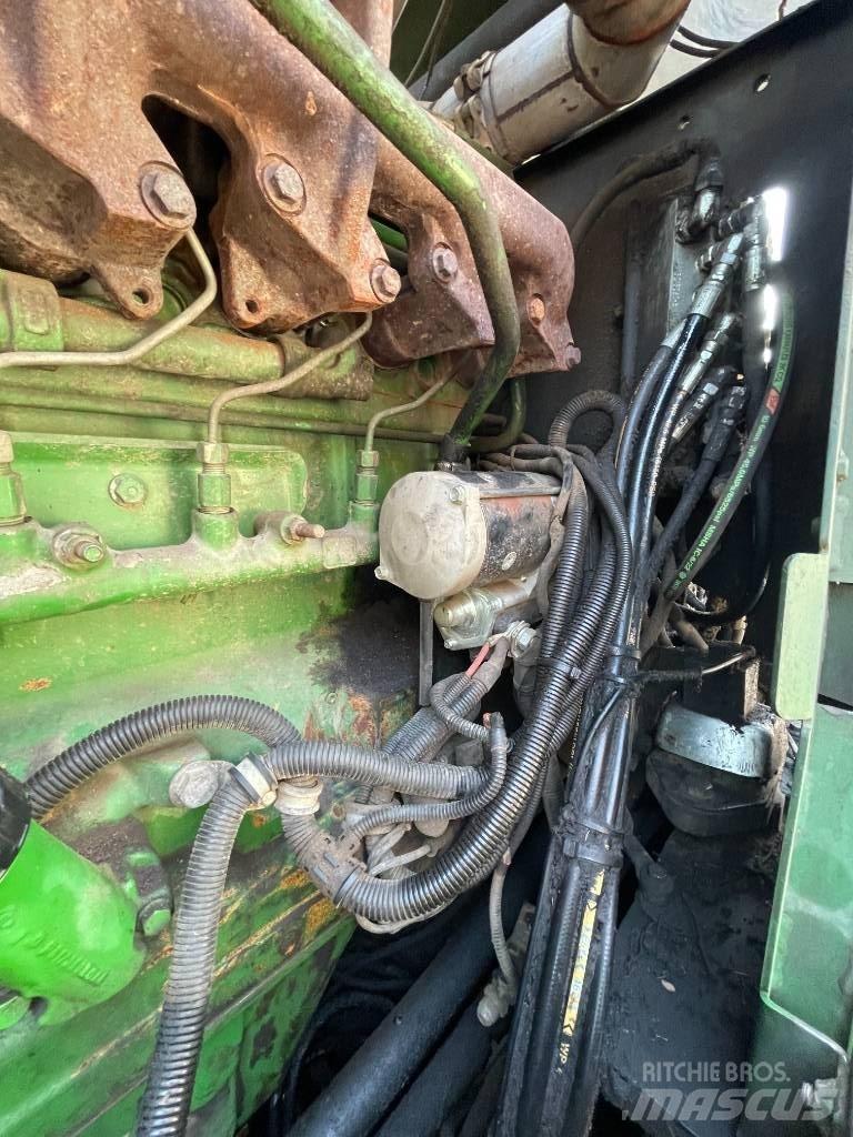 John Deere 1070E Харвестеры