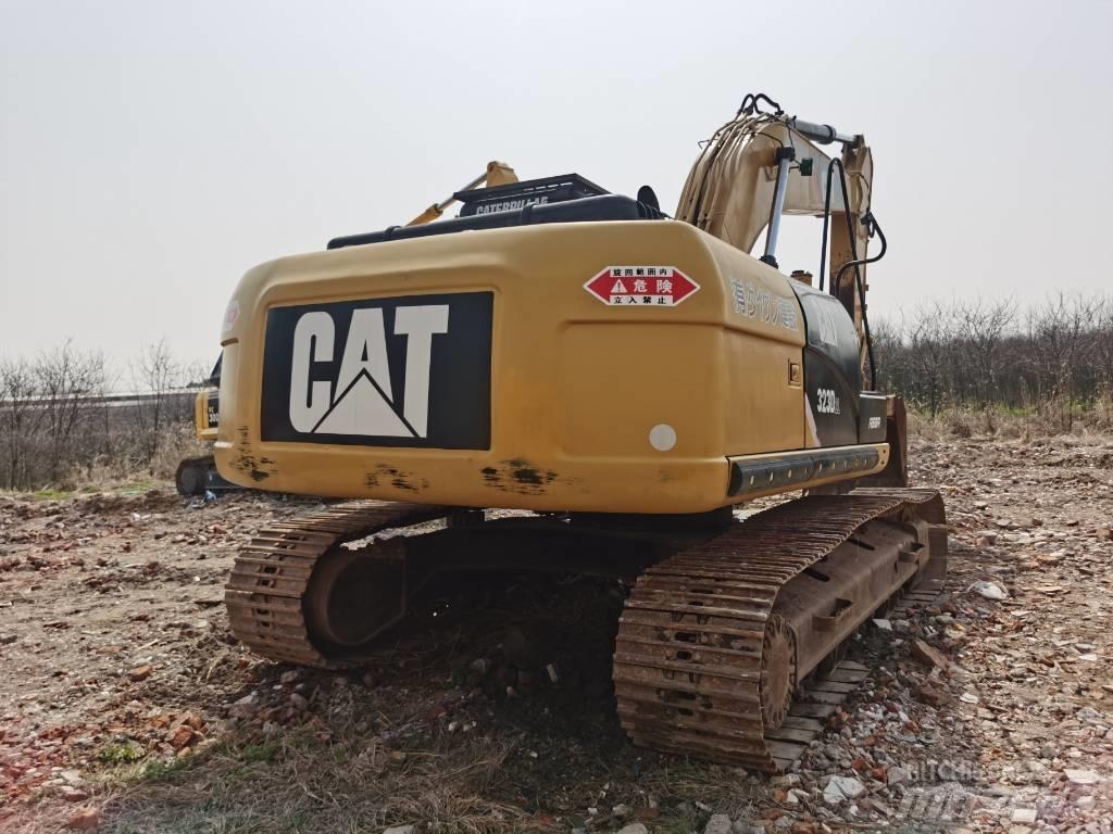 CAT 323 D L Гусеничные экскаваторы