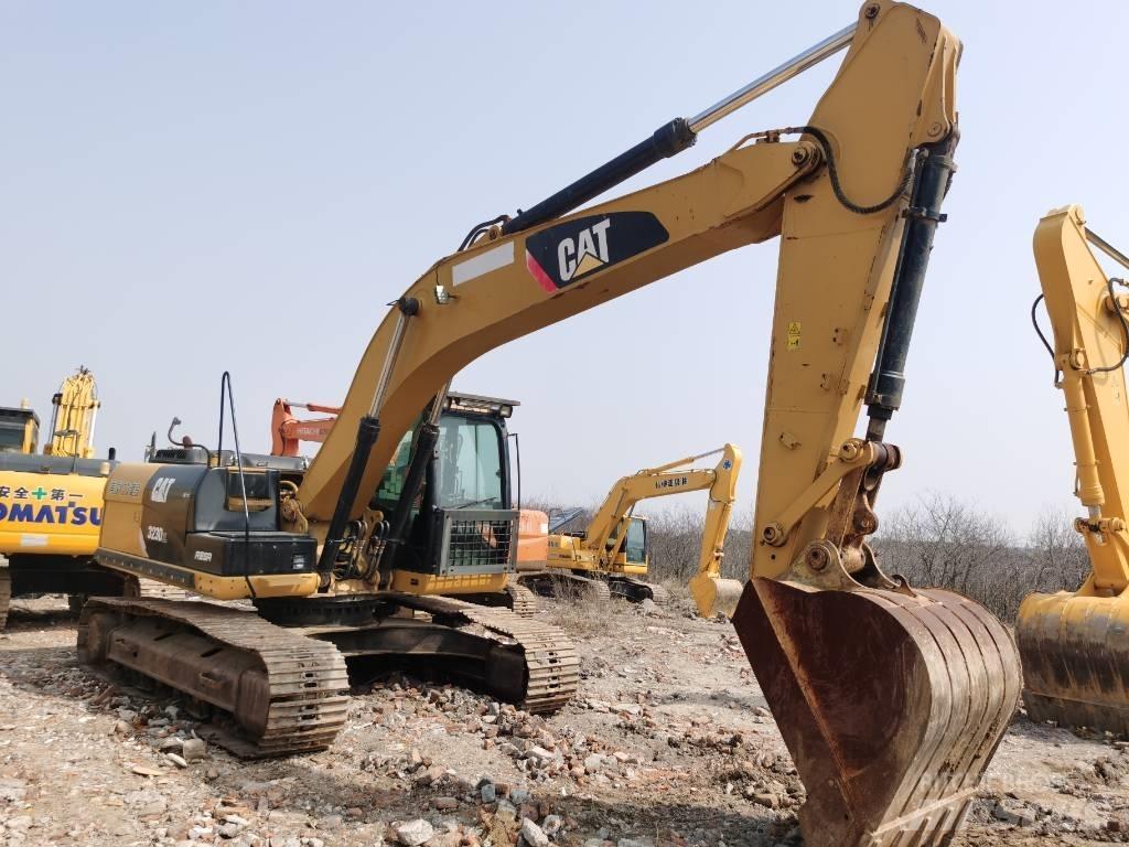 CAT 323 D L Гусеничные экскаваторы