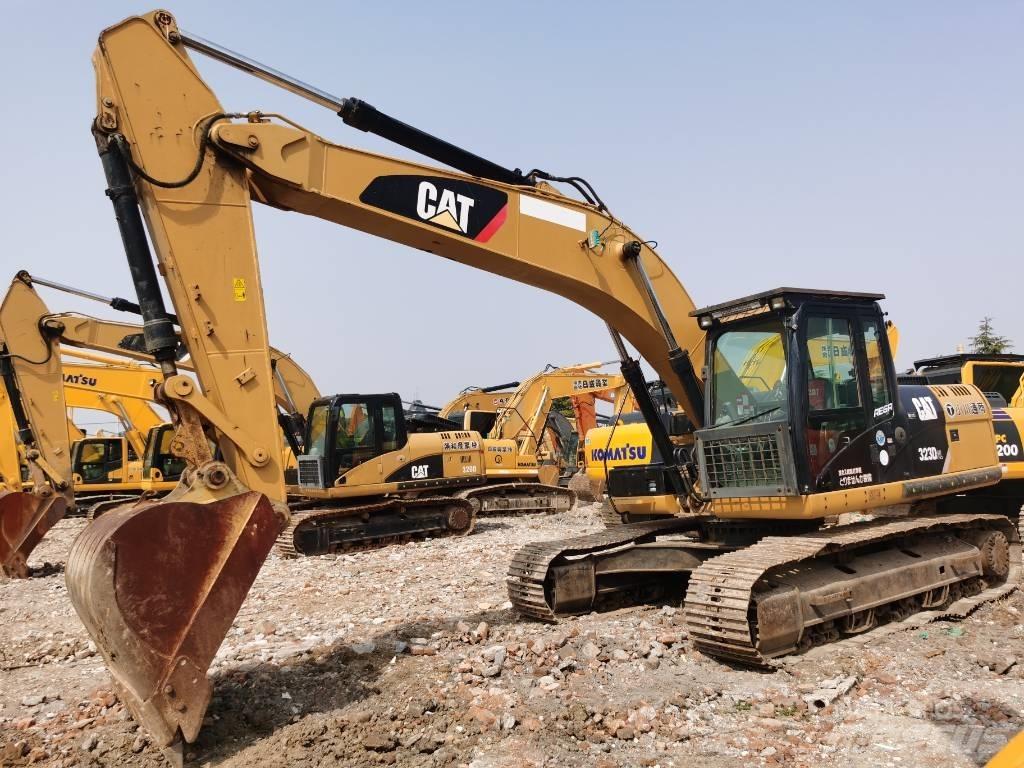 CAT 323 D L Гусеничные экскаваторы