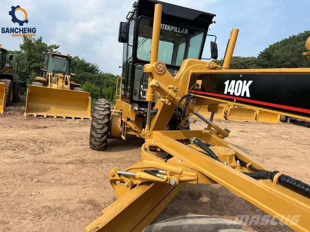 CAT 140K Грейдеры