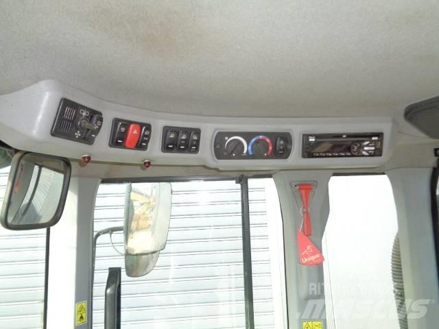 CAT 938M Фронтальные погрузчики