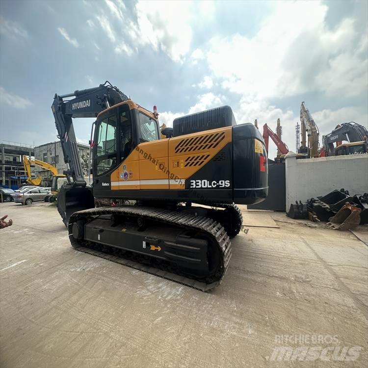 Hyundai 330 Гусеничные экскаваторы