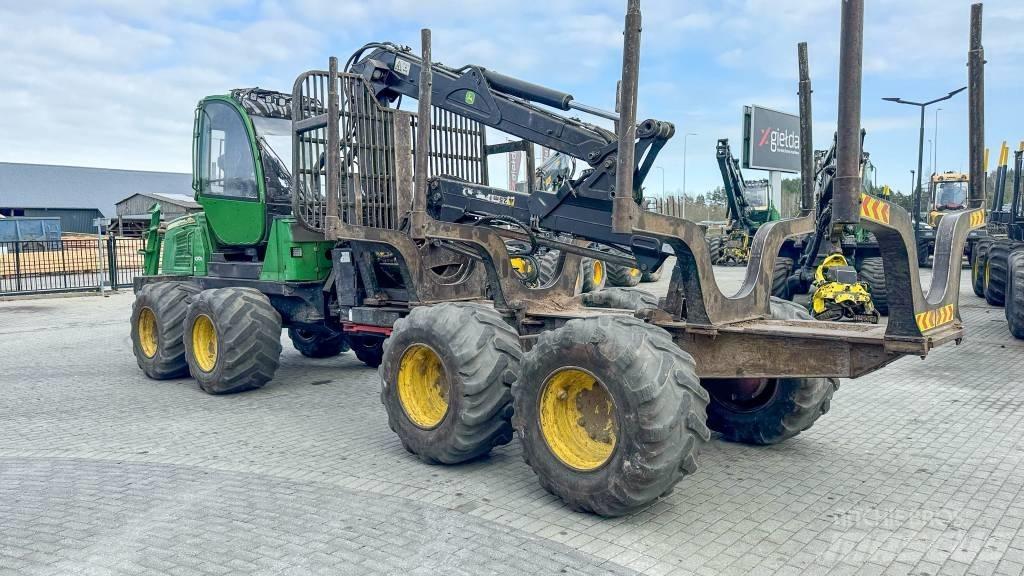 John Deere 1010 E Форвардеры