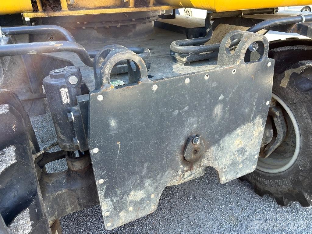 Komatsu PW148 -10 Колёсные экскаваторы