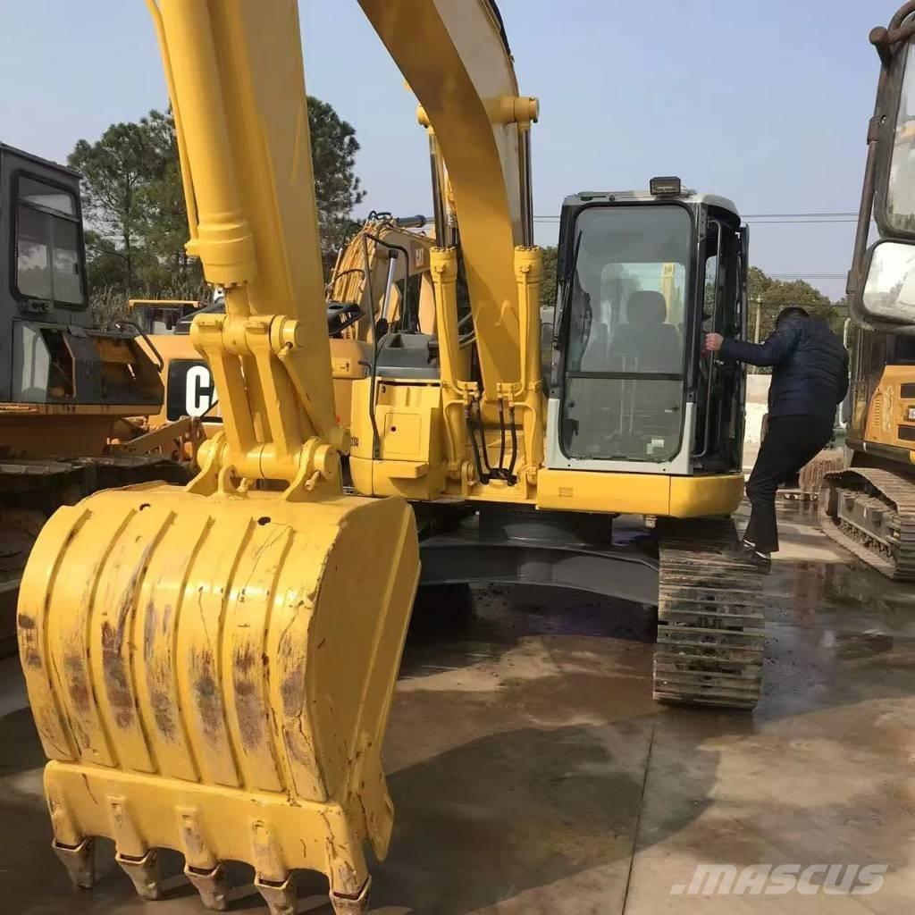 Komatsu PC 138 US Малые экскаваторы 7т-12т