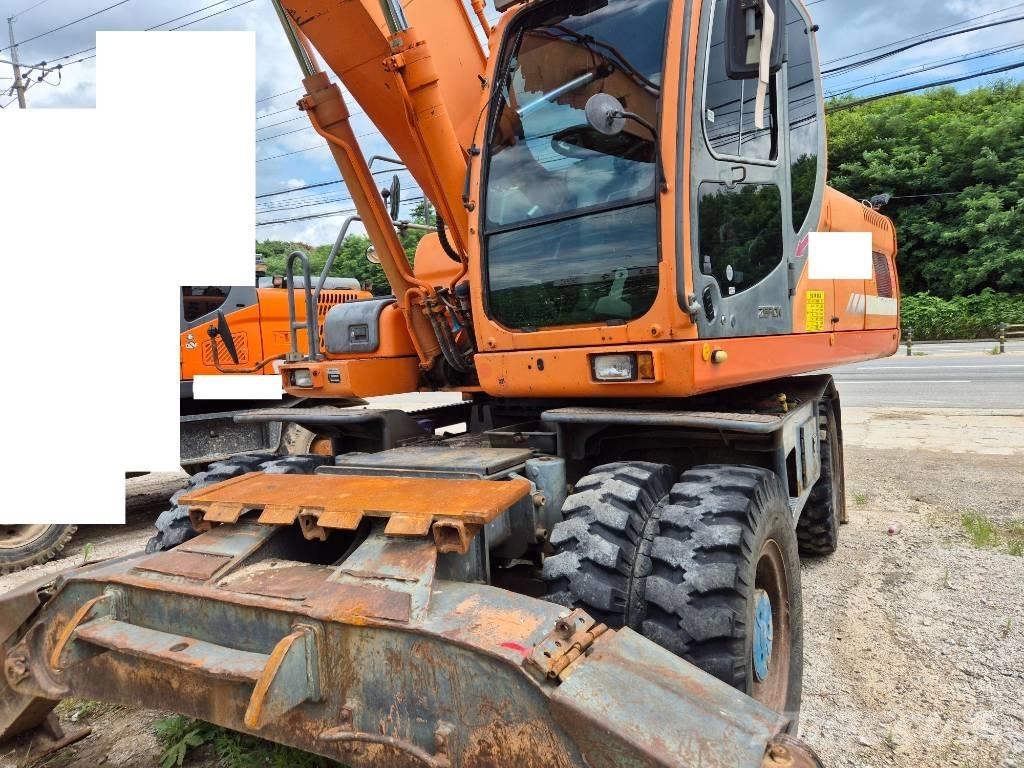 Doosan DX210WA Колёсные экскаваторы