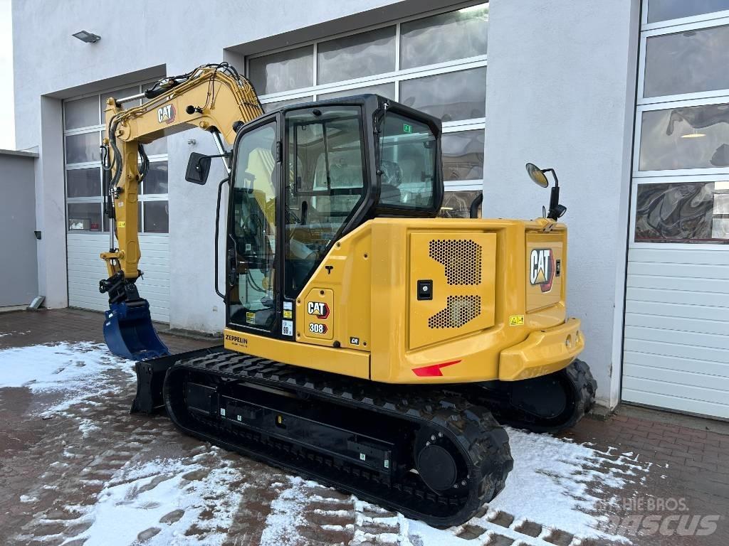 CAT 308 Малые экскаваторы 7т-12т