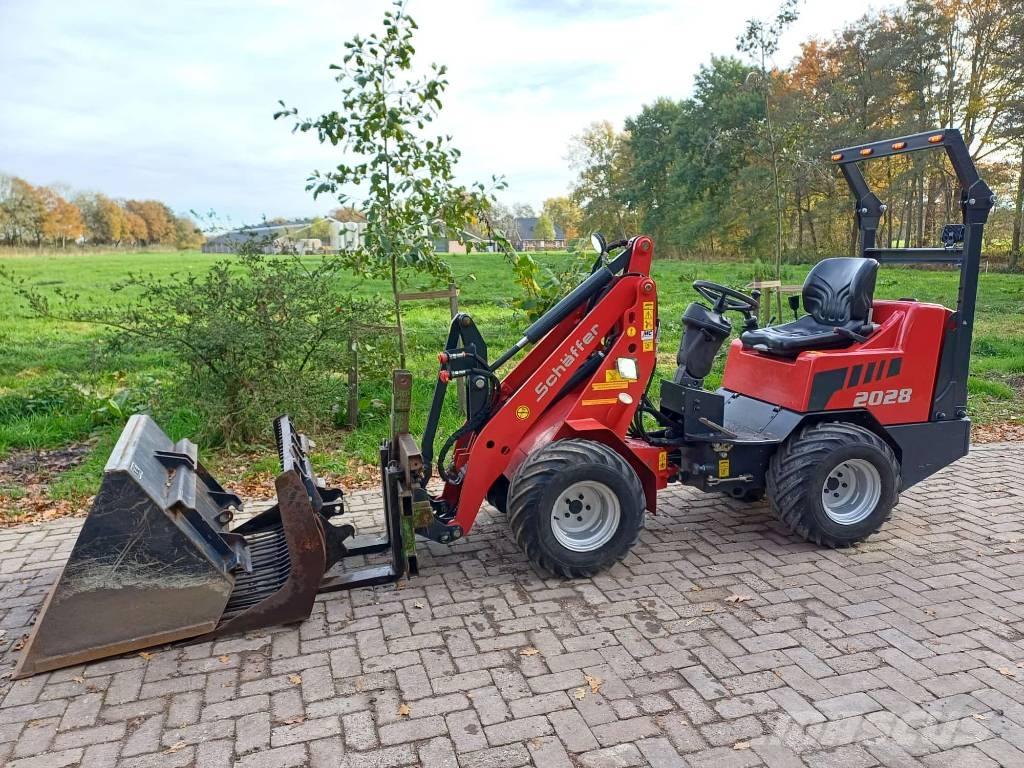 Schäffer 2028 Многофункциональные сельскохозяйственные погрузчики