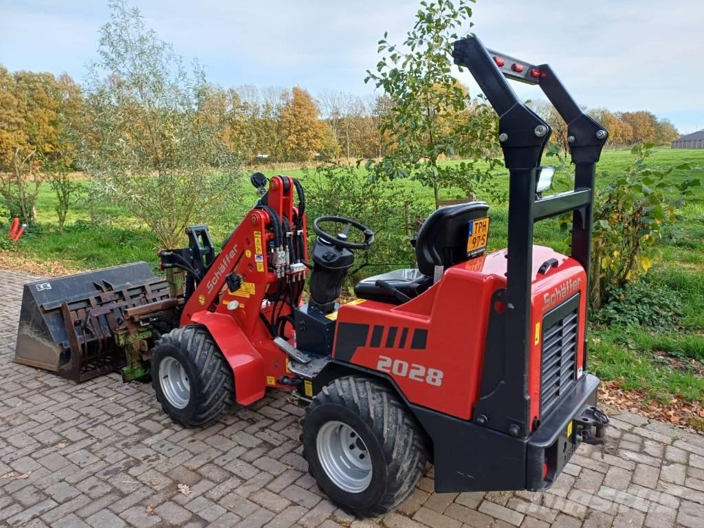 Schäffer 2028 Многофункциональные сельскохозяйственные погрузчики