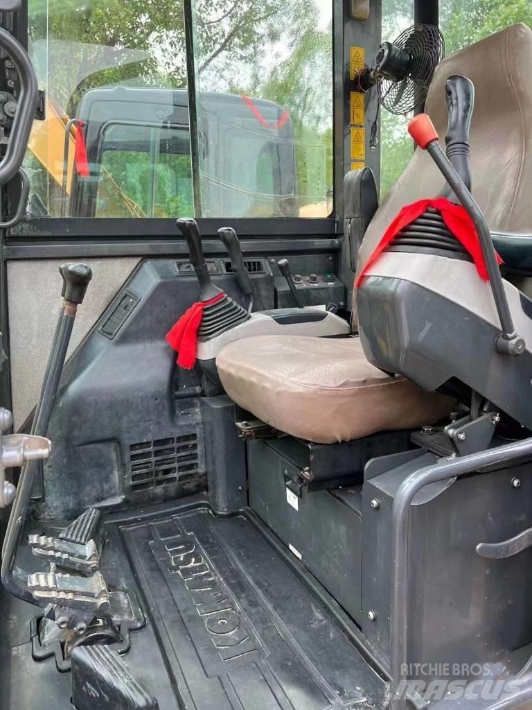 Komatsu PC56-7 Гусеничные экскаваторы
