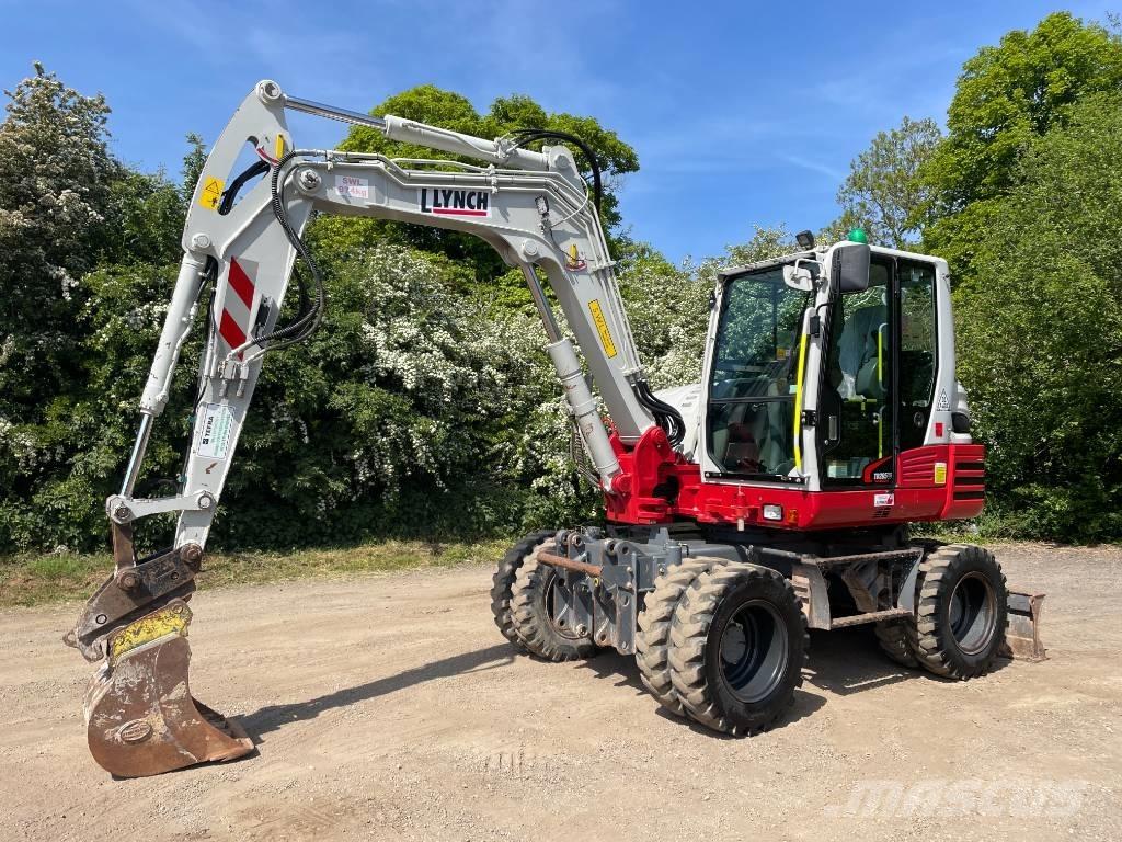 Takeuchi TB 295 W Колёсные экскаваторы
