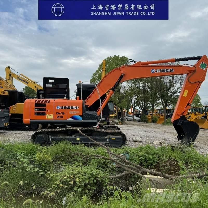 Hitachi ZX 210 Гусеничные экскаваторы