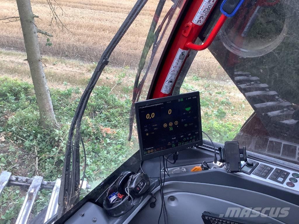 Komatsu 951 Харвестеры