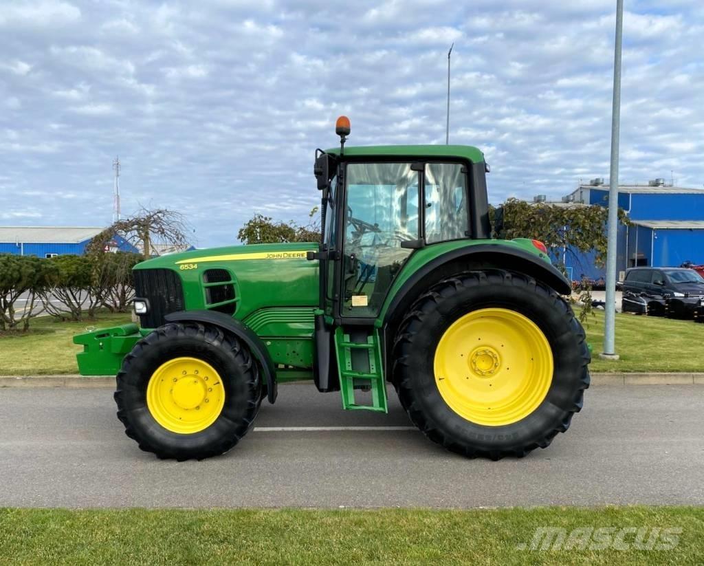 John Deere 6534 Трактора