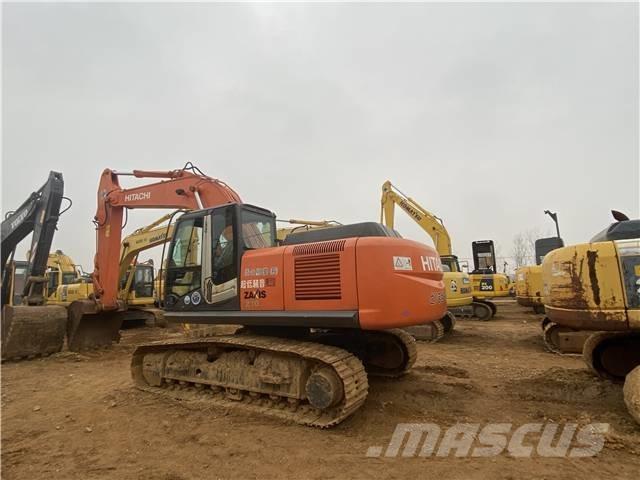 Hitachi ZX 210 Гусеничные экскаваторы