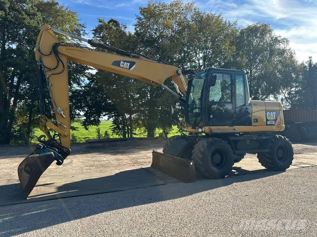 CAT M 313 D - 13.285H Колёсные экскаваторы