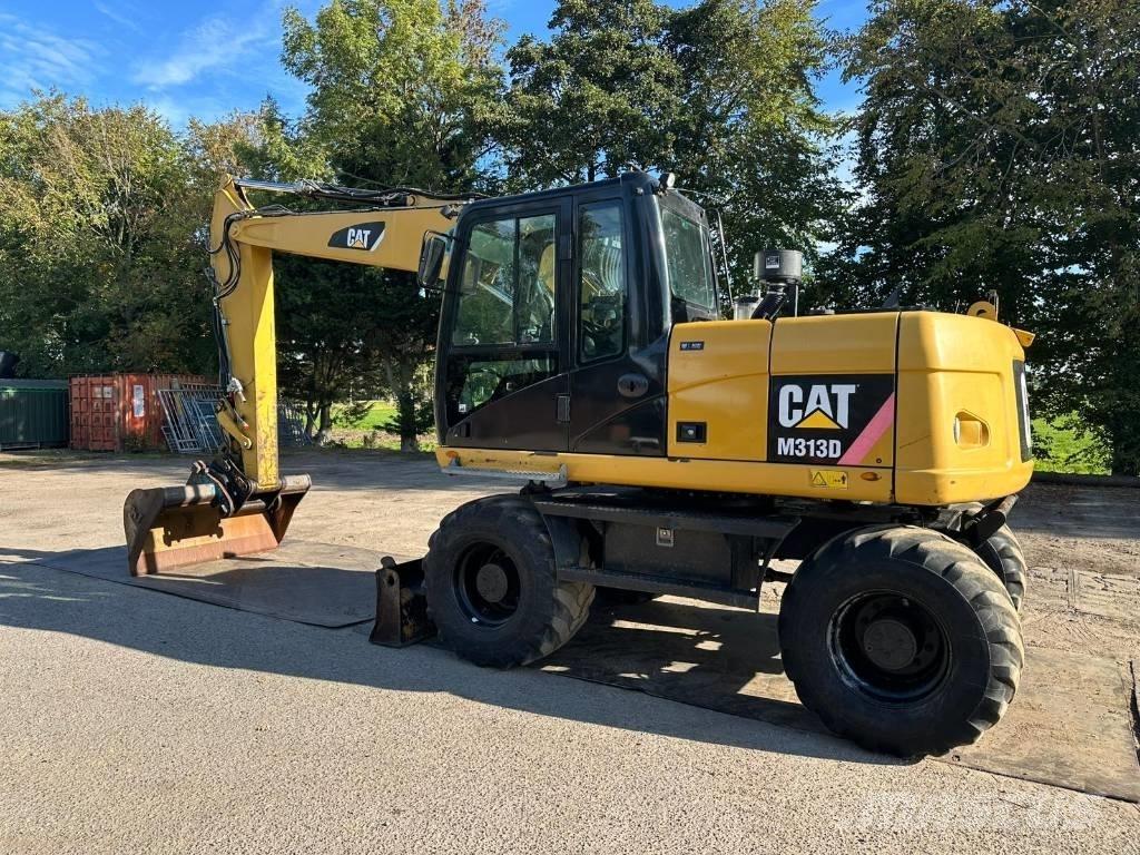 CAT M 313 D - 13.285H Колёсные экскаваторы