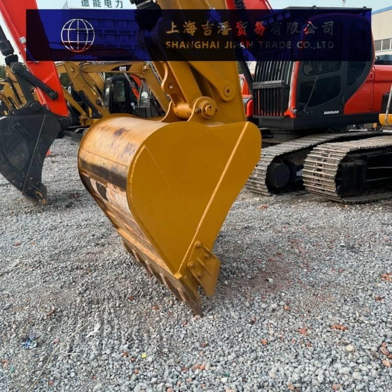 CAT 323 Гусеничные экскаваторы