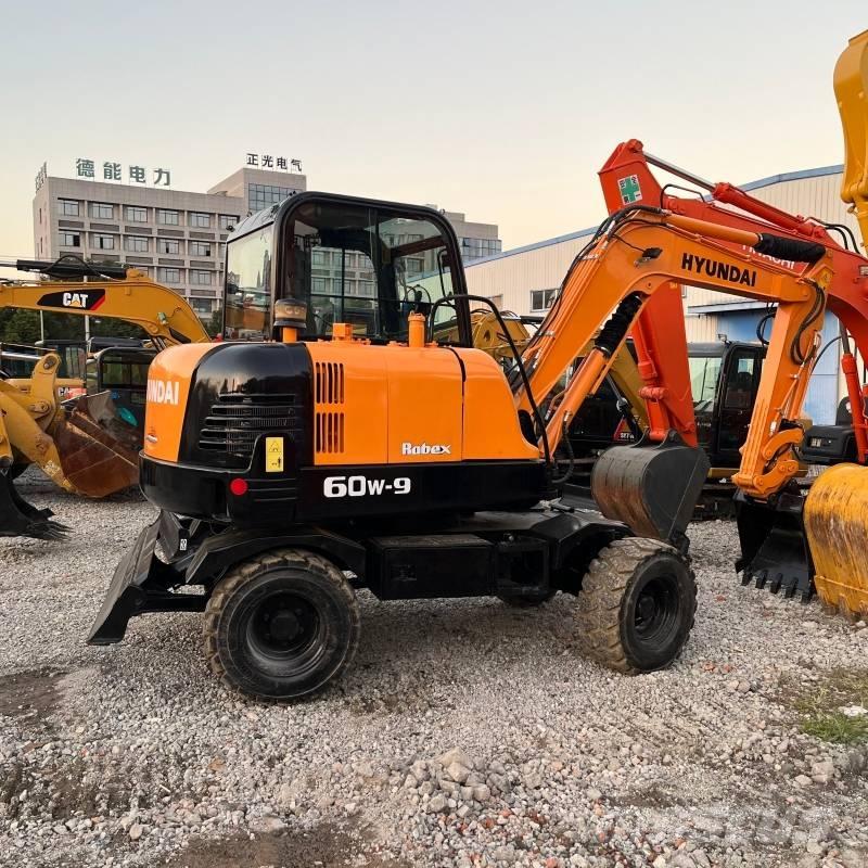 Hyundai R60W-9 Колёсные экскаваторы