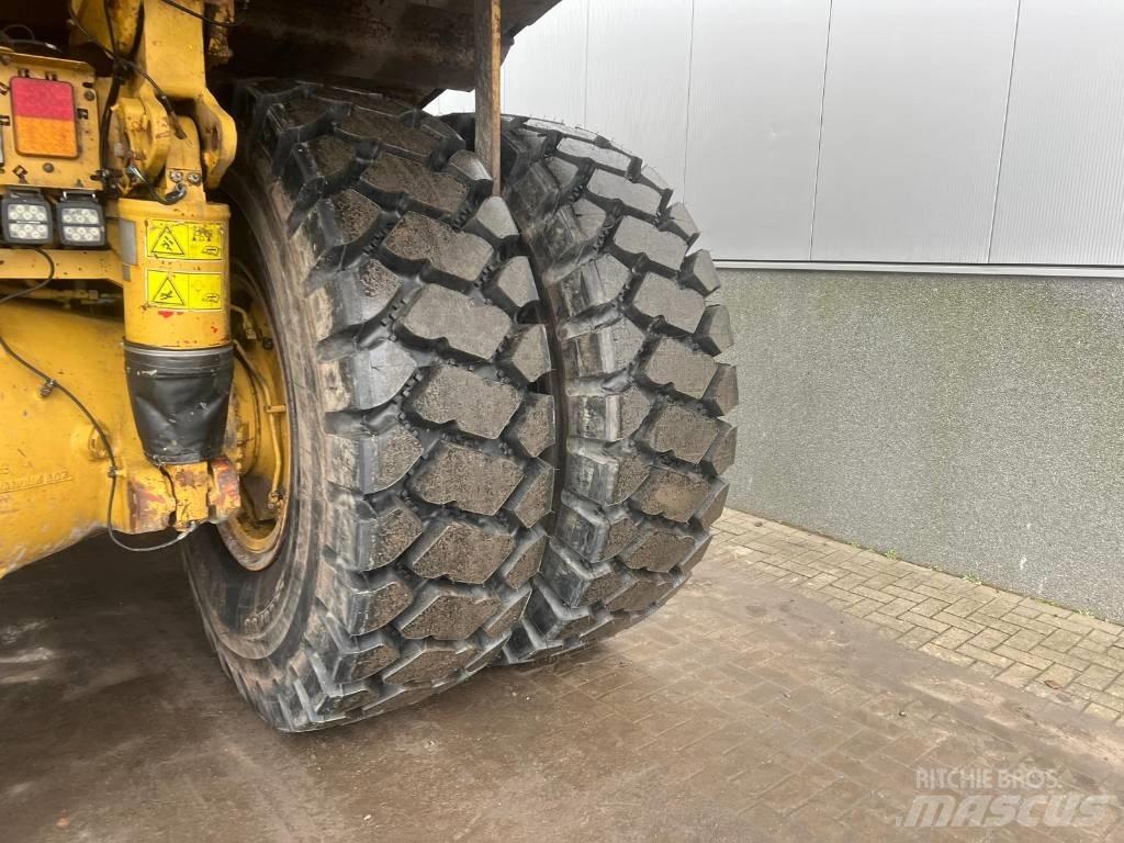 CAT 775 G Карьерные самосвалы