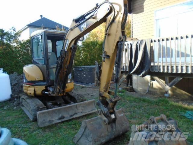 CAT 303 CR Мини-экскаваторы