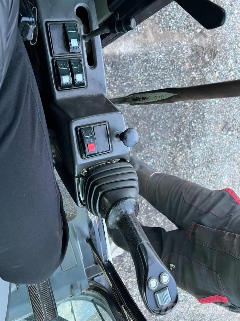 CAT M 313 D Колёсные экскаваторы