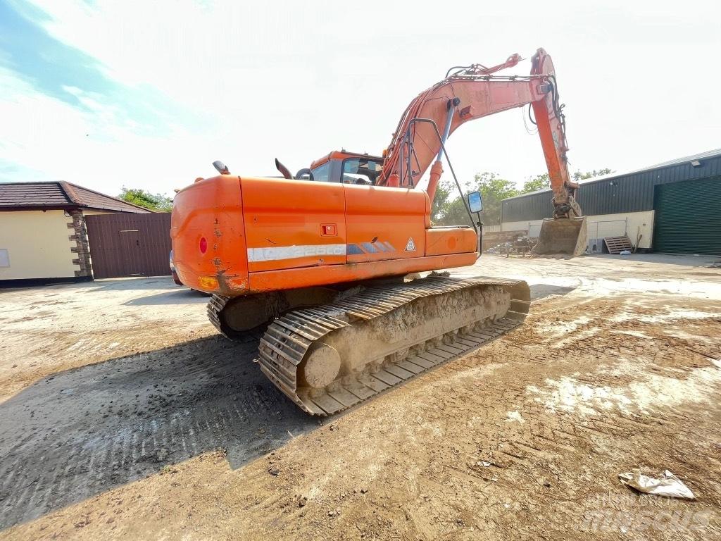 Doosan DX225 Колёсные экскаваторы
