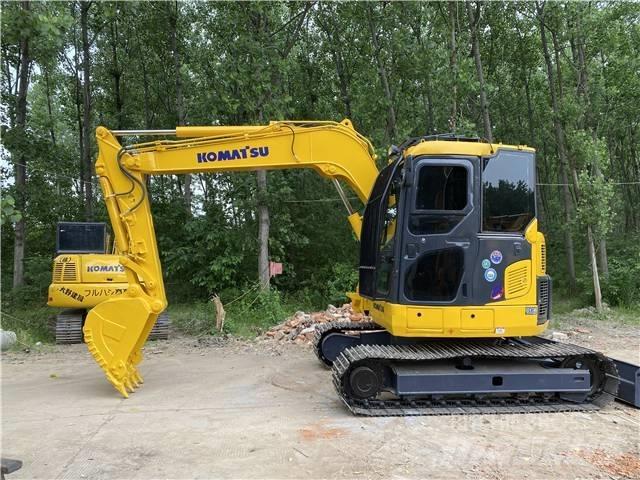 Komatsu PC78US Гусеничные экскаваторы