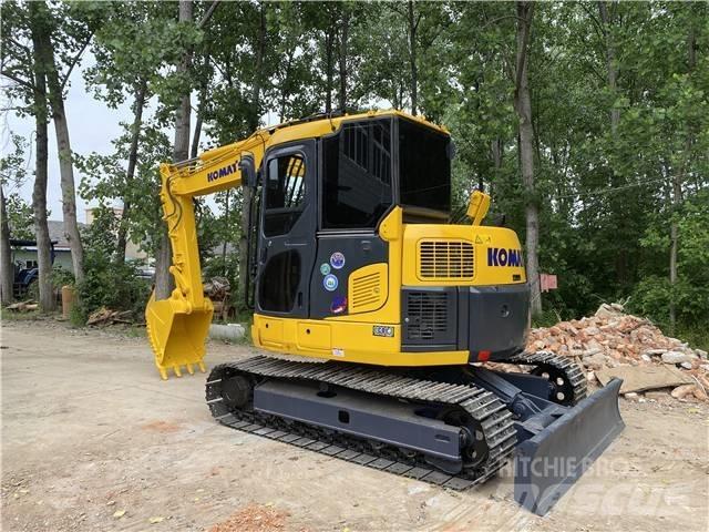 Komatsu PC78US Гусеничные экскаваторы
