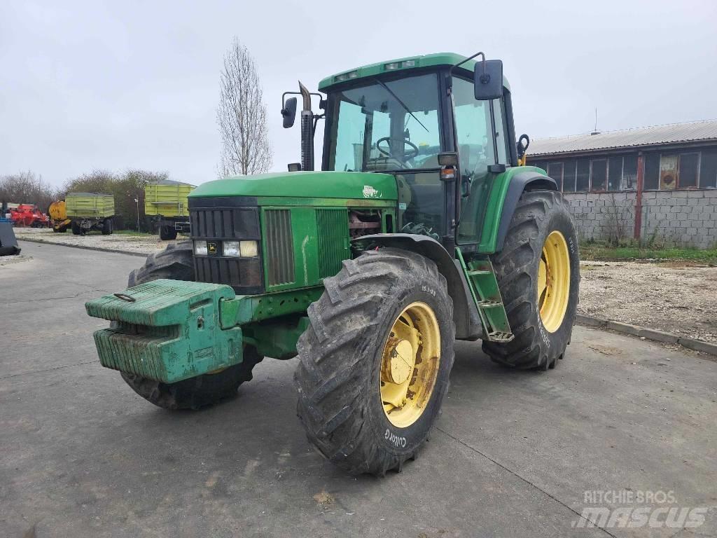 John Deere 6910 Трактора